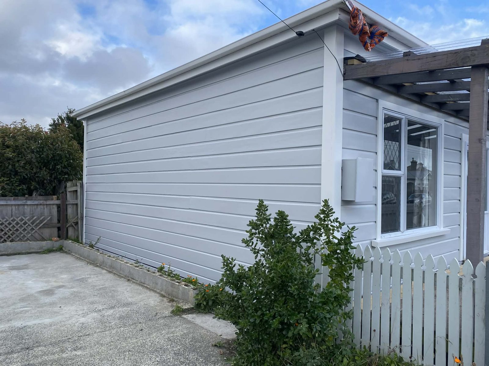 Substantial residential exterior renovation and repaint completed by TKR Painting